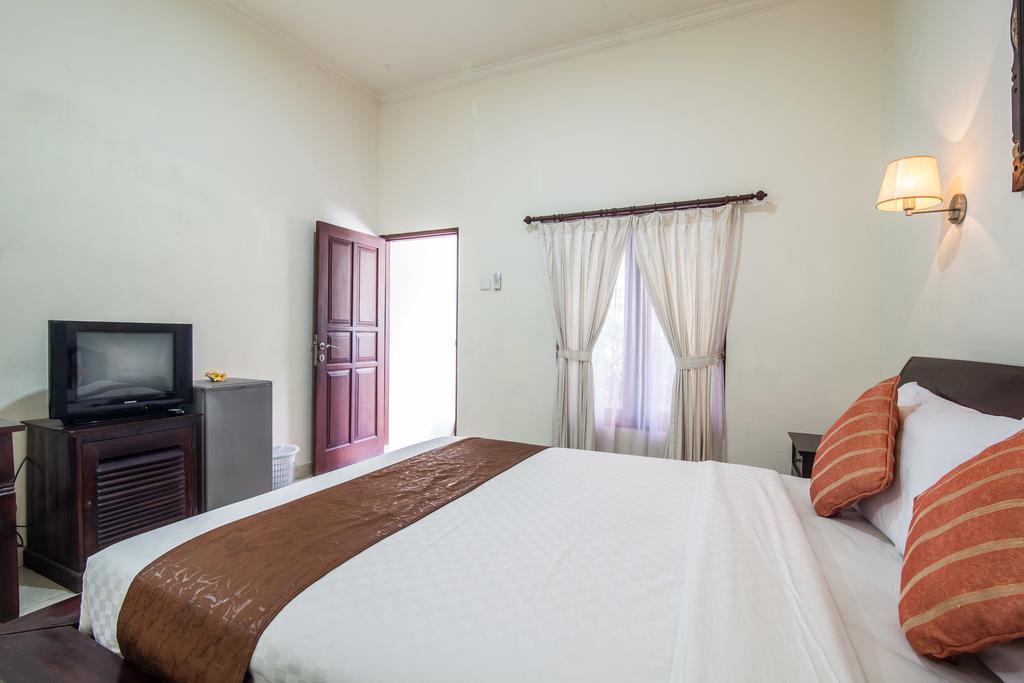 Puri Yuma Hotel Denpasar Zewnętrze zdjęcie